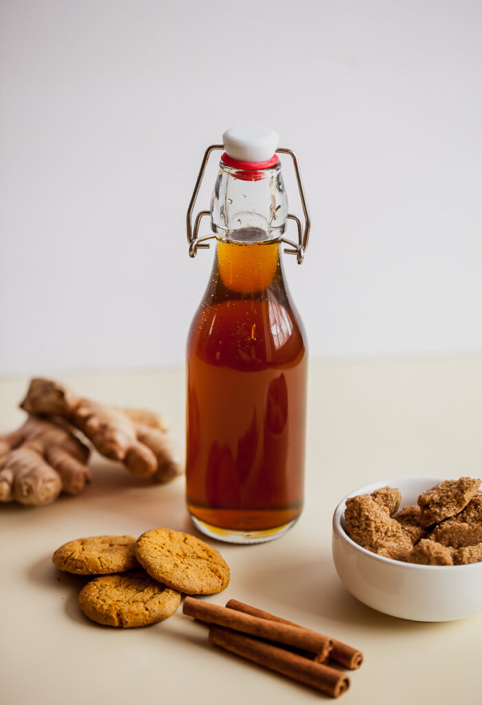 simple syrup in a bottle with gingerbread ingredients